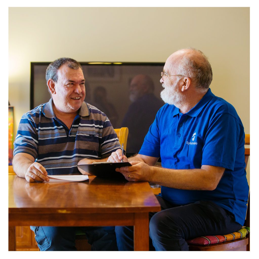 Client and support worker talking