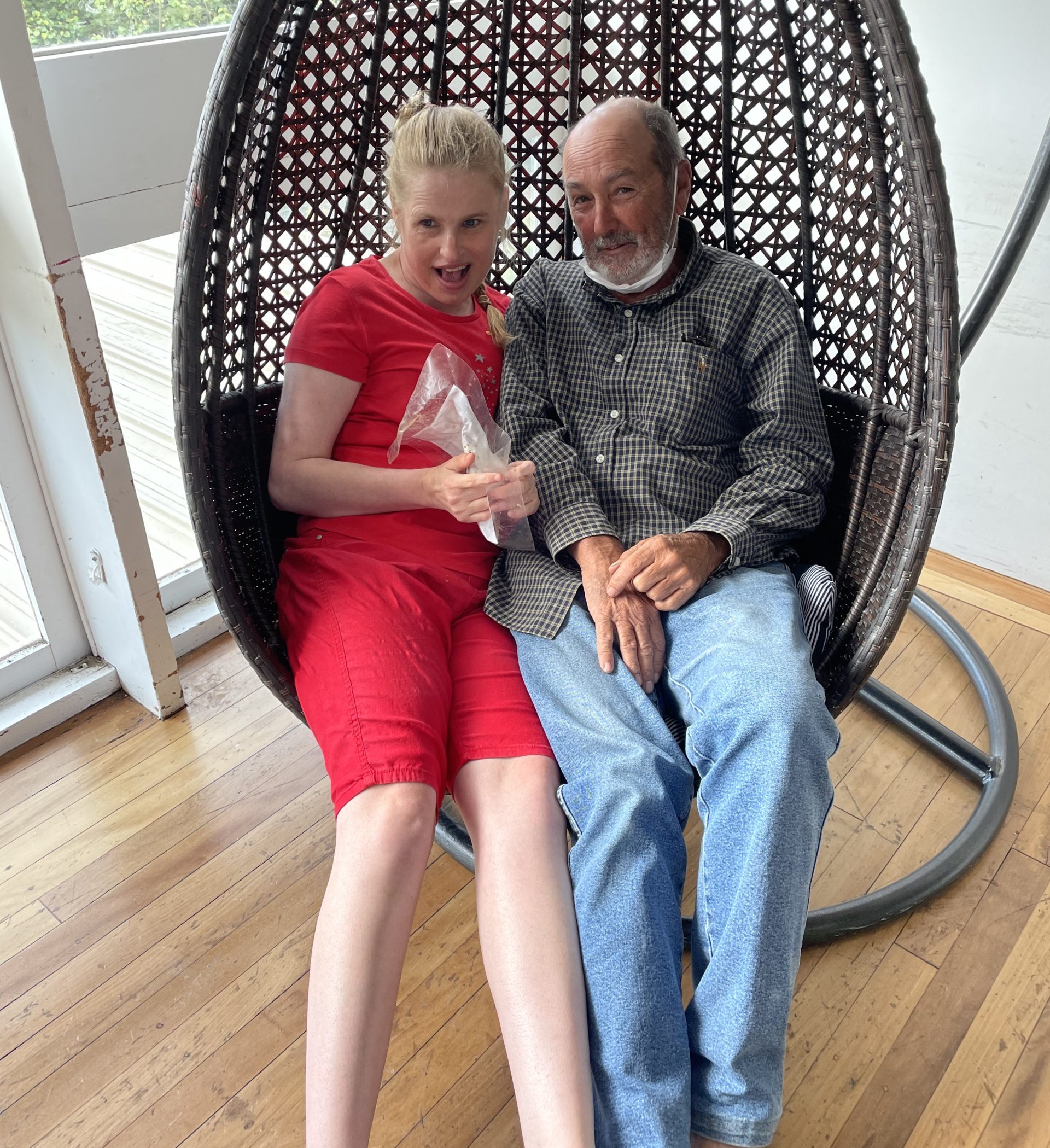 Sarah and Dad in her favourite Egg Swing chair (HUB 2022 Christmas Party)